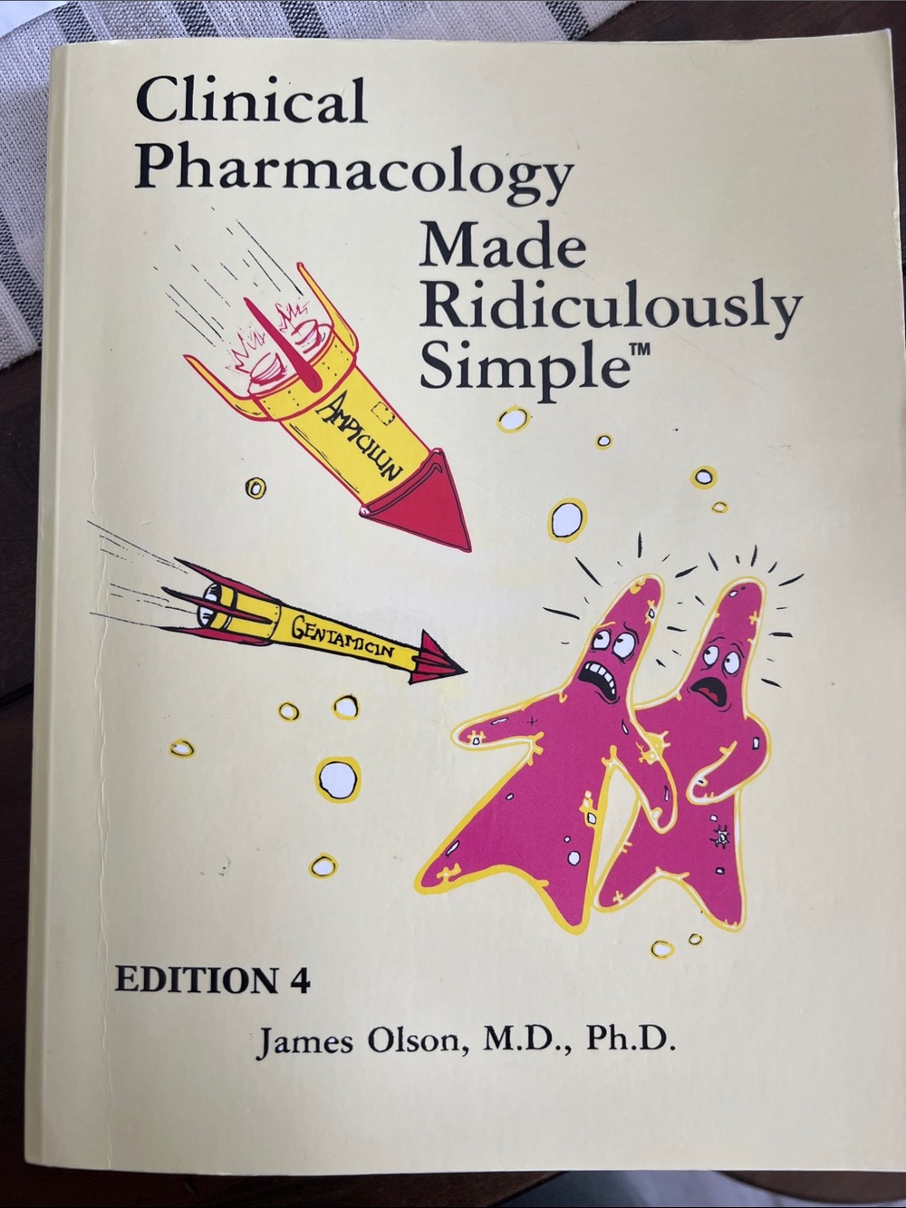 Clinical Pharmacology Made Ridiculously Simple — Cream Cover with Pink Artwork